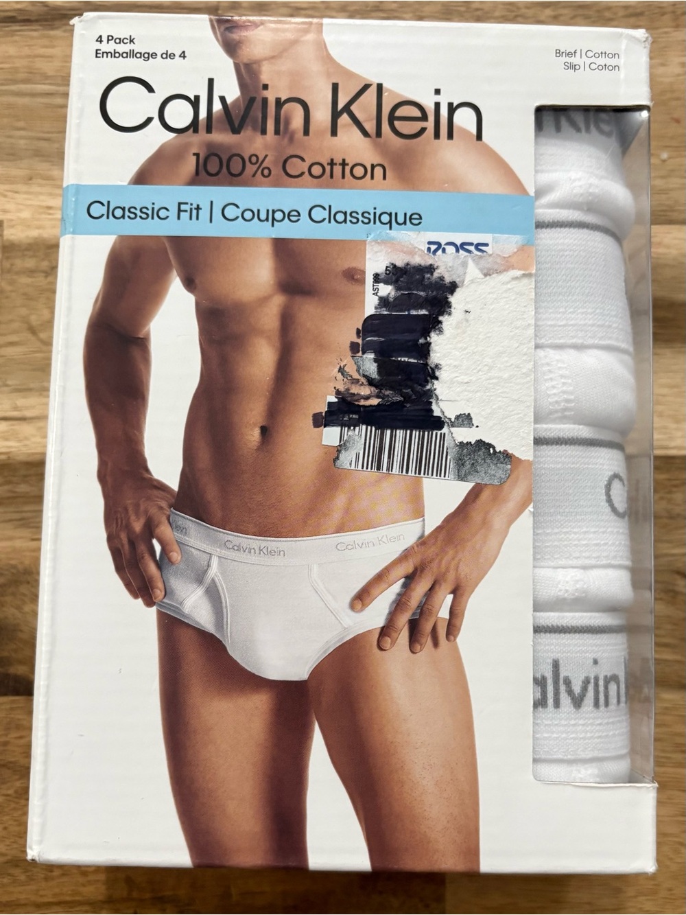 Calvin Klein Men's 4-Pack Cotton Briefs in classic white Size Medium